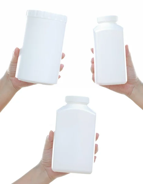Три чистые белые бутылки — стоковое фото