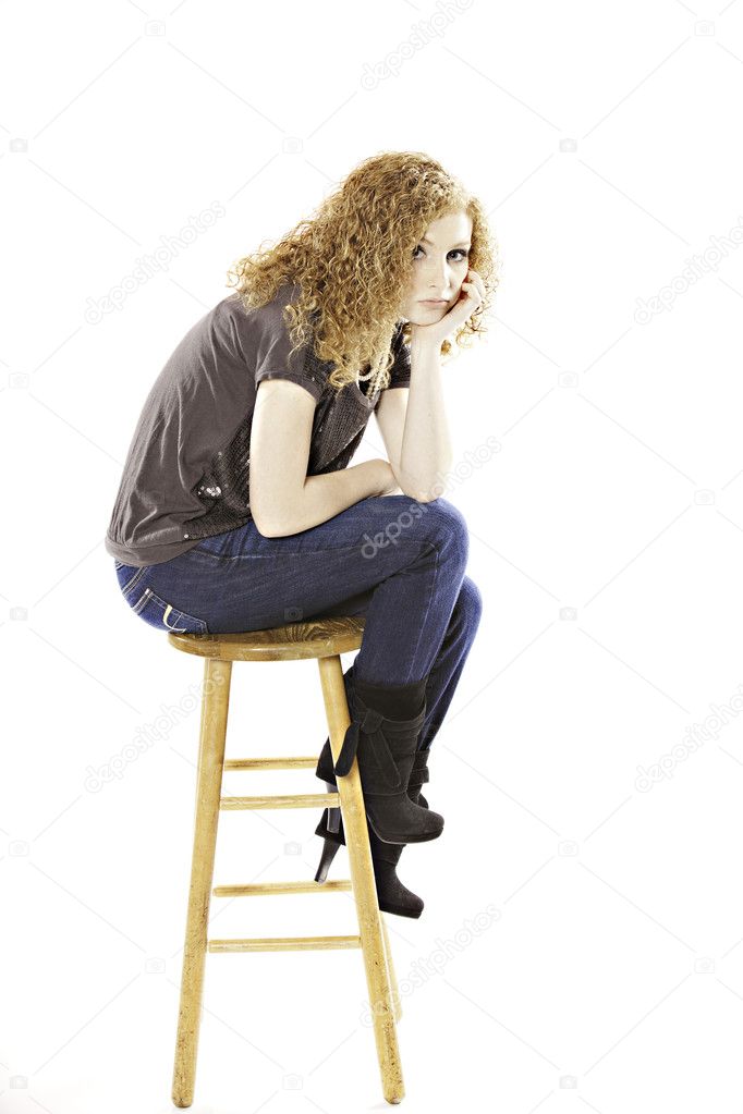 Teenage Girl Seated on Stool