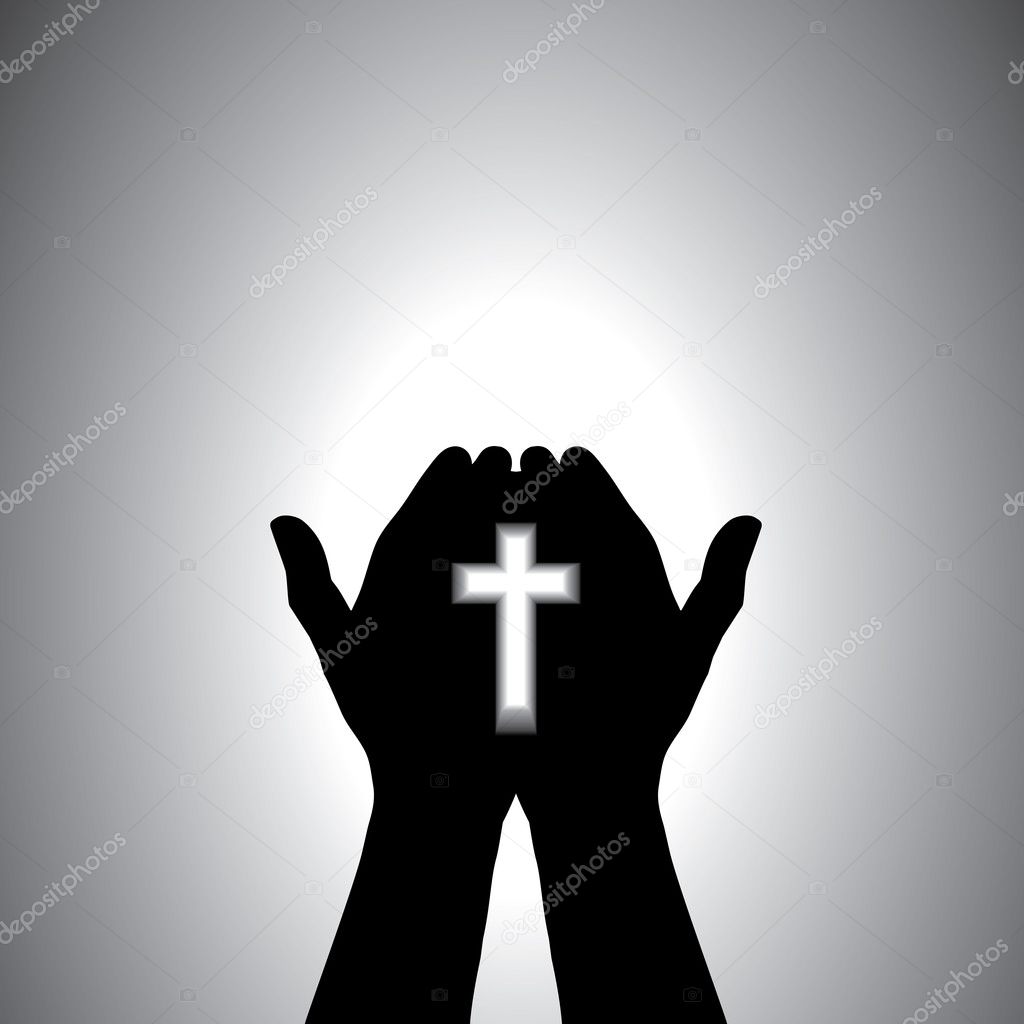 Devout christian worshiping with cross in hand