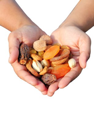 Woman holding bunch of dry fruits isolated on white clipart