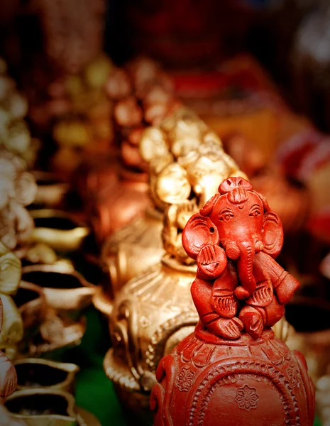 Lord Ganesh idol made of clay and painted red — Stock Photo, Image