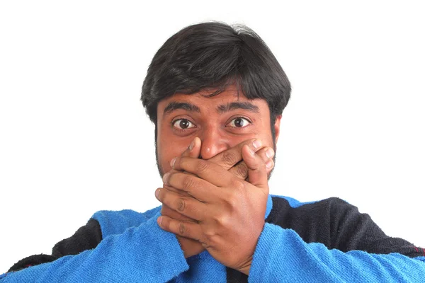 stock image Young south indian youth closing mouth in disbelief