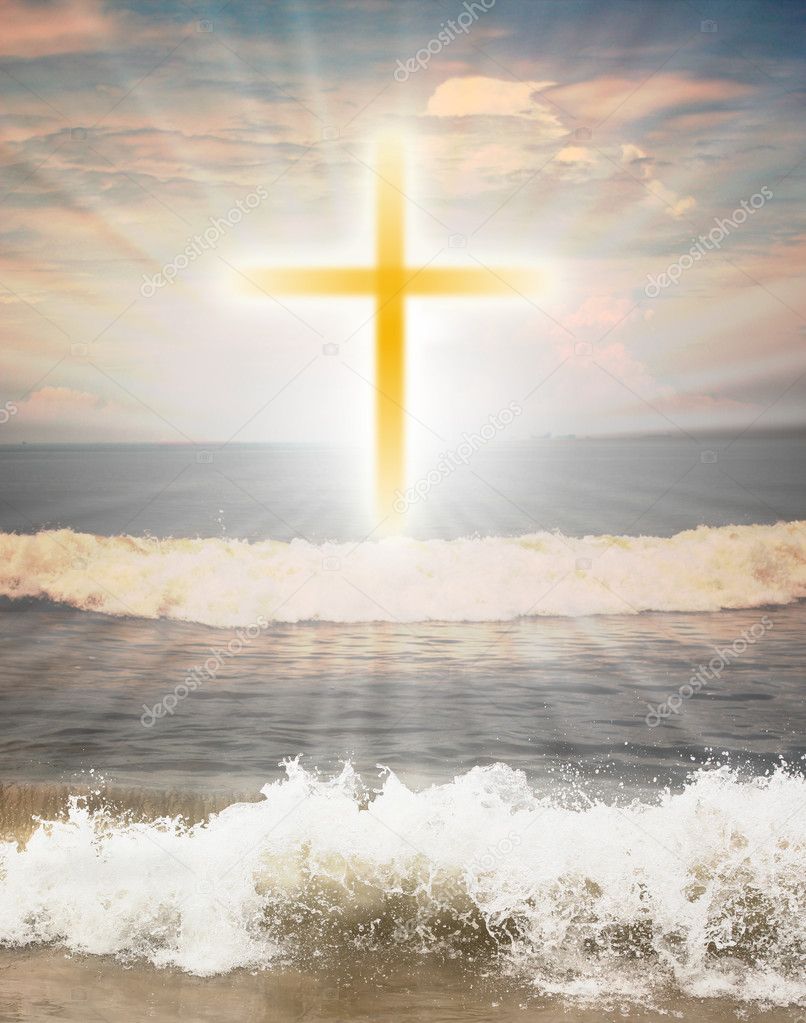 Christian religious symbol cross against sun shine