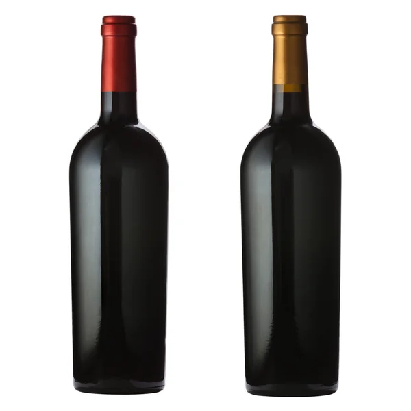 stock image Red wine bottles on white