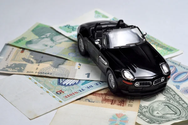 Чорний спортивний автомобіль і гроші Ліцензійні Стокові Зображення