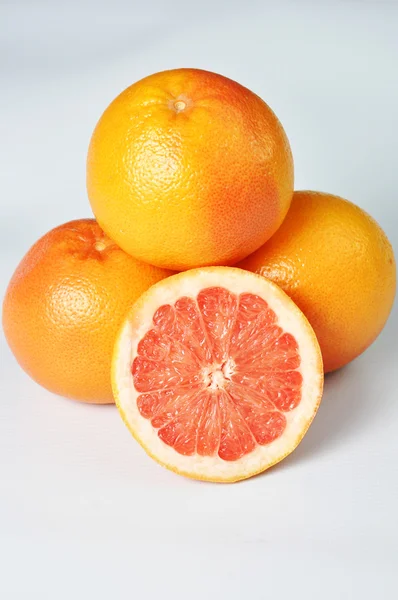 stock image Red grapefruit isolated on white background