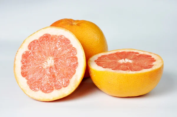 stock image Red grapefruit isolated on white background