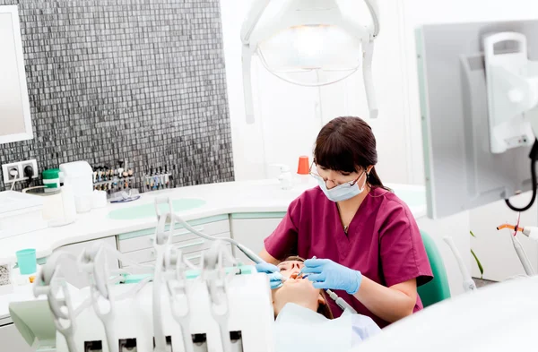Dentist in modern cabinet — Stock Photo, Image