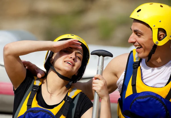 Happy couple rafting equipment — Stock Photo, Image