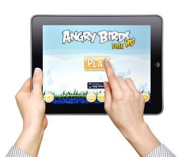 Woman play in the game Angry Birds clipart