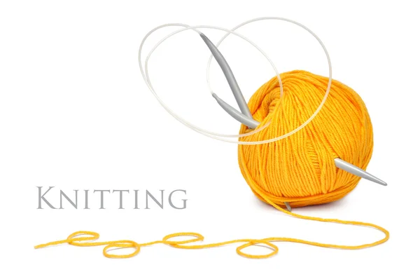 Yellow wool and knitting needles — Stock Photo, Image