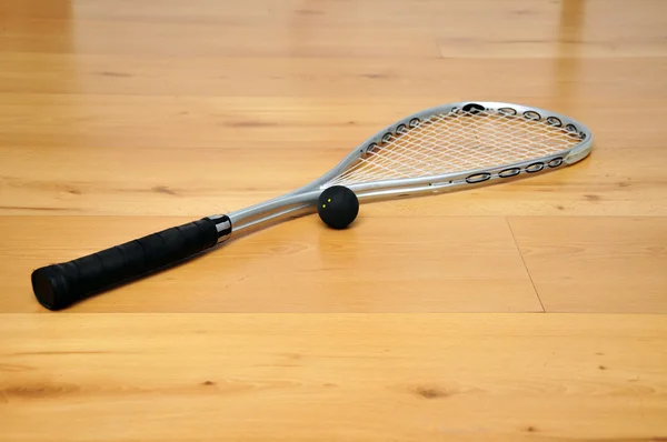 Squash racket and ball — Stock Photo, Image