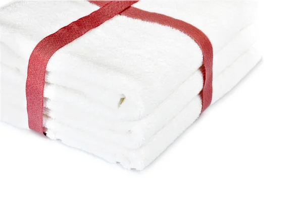 Towels with red ribbon — Stock Photo, Image