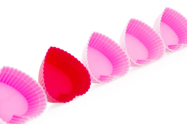 Maletas de bollo de silicio en forma de corazón rojo y rosa — Foto de Stock