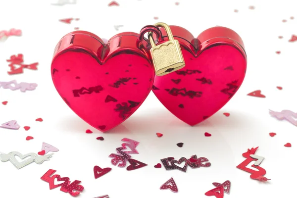 Wedlocked, two hearts locked, with small decorations, isolated — Stock Photo, Image