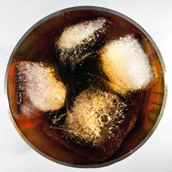 Coca with ice in a glass — Stock Photo, Image