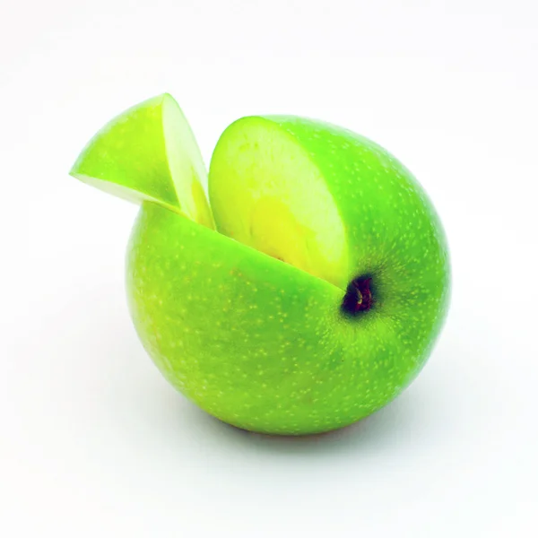 Manzana verde con un segmento — Foto de Stock