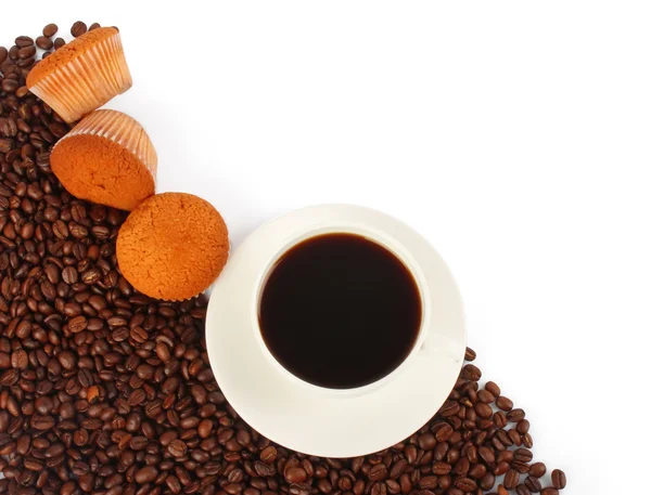 Cup of coffee, muffin and beans — Stock Photo, Image