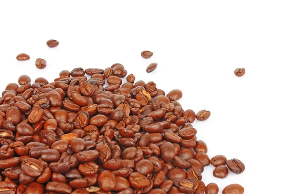Горсть кофейных зерен — стоковое фото