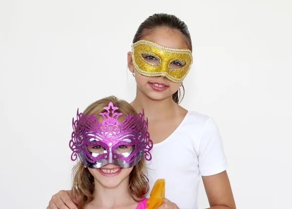 Meisjes met masker Stockfoto