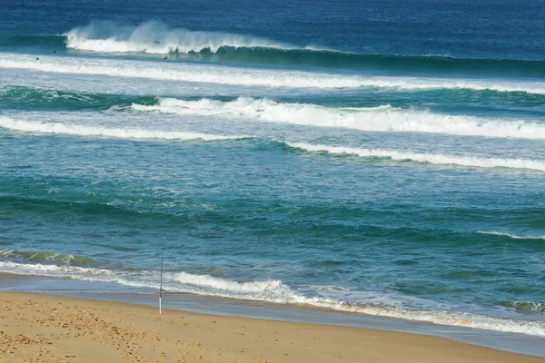 Olta ve sörfçü — Stok fotoğraf