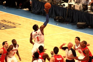 Amare Stoudemire getting the ball during NBA knicks match at madison square garden clipart