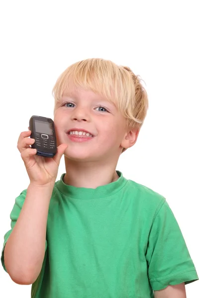 휴대 전화를 가지고 있는 소년 — 스톡 사진