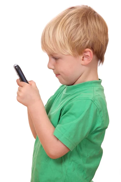 Pojke med mobiltelefon — Stockfoto