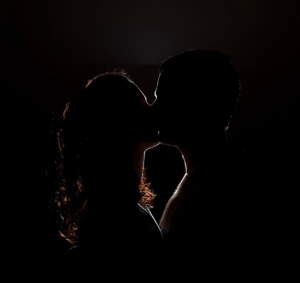 Silhouette eines Kusses — Stockfoto