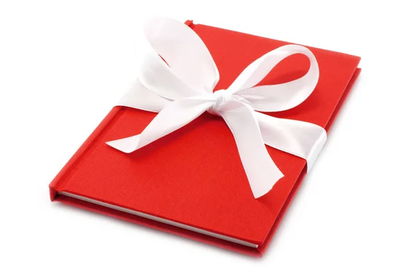 Notepad with white bow — Stock Photo, Image