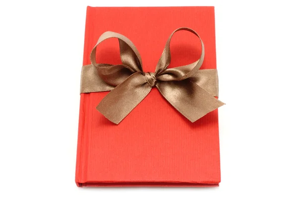 Notepad with brown bow — Stock Photo, Image