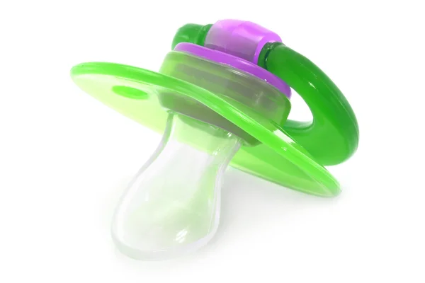 Green baby silicone pacifier — Stock Photo, Image