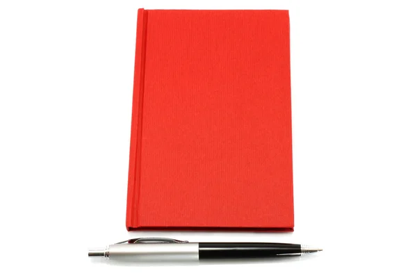 Kırmızı notepad ile topu kalem — Stok fotoğraf
