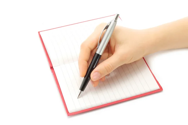 Γυναίκα γραφής χέρι στο σημειωματάριο — Φωτογραφία Αρχείου
