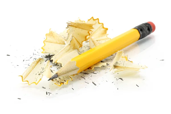 Sharpening pencil and wood shavings — Stock Photo, Image