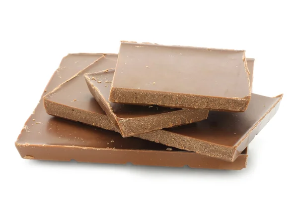 Stukken van melkchocolade — Stockfoto