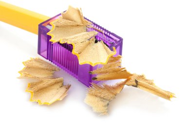 Sharpening pencil and wood shavings clipart