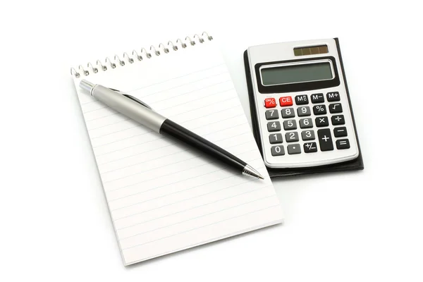 Bloco de notas com caneta bola e calculadora — Fotografia de Stock