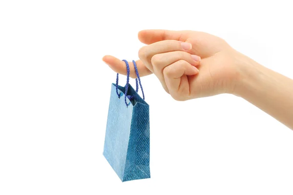 Hand holds shopping bag — Stock Photo, Image