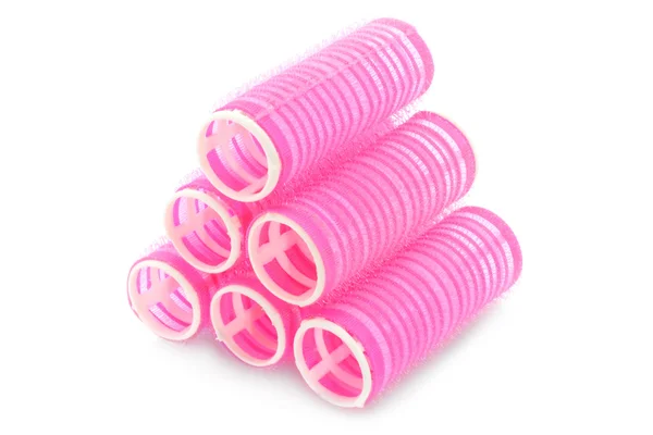 Stack of pink hair rollers — Stock Photo, Image