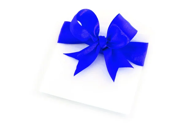 Sheet with blue holiday bow — Stock Photo, Image