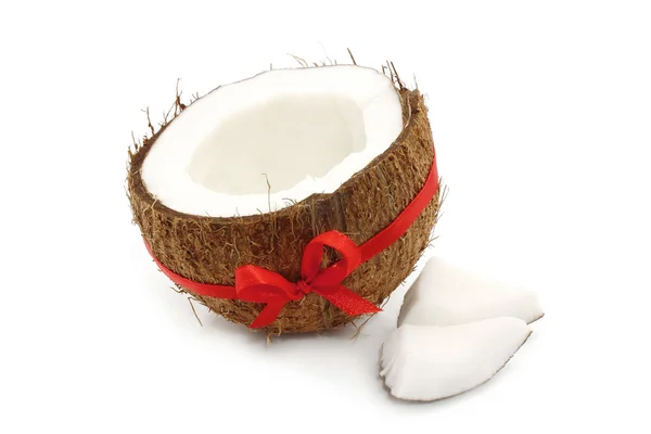 Fresh coconut with red bow — Stock Photo, Image