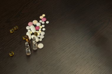 Pile drugs on table clipart