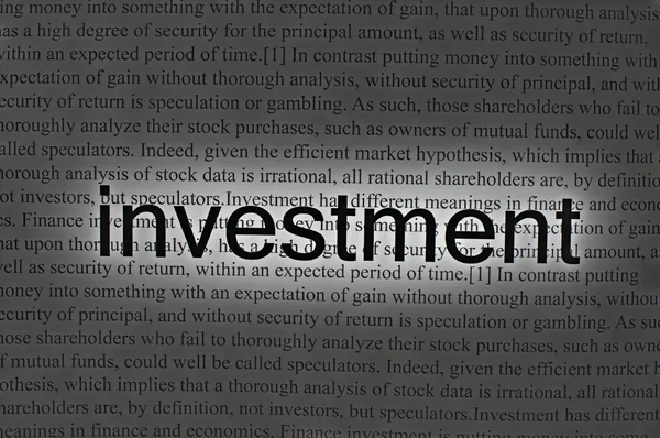 Investimento de texto em papel — Fotografia de Stock