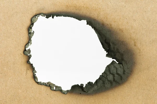 Burned paper and hole — Zdjęcie stockowe