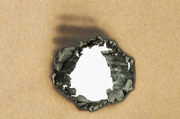 Burned paper and hole — Zdjęcie stockowe