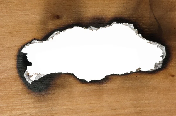 Burned wooden paper and hole — Stock Photo, Image