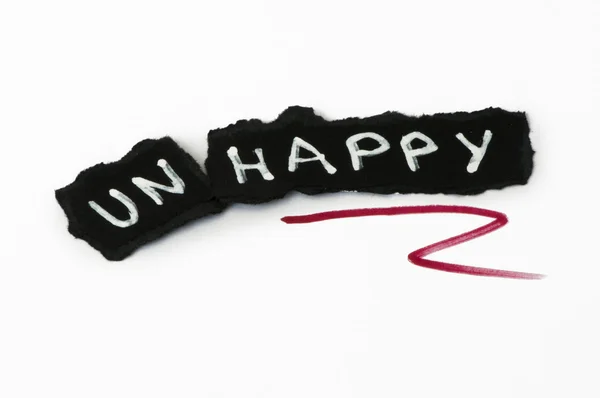 Счастливый текст на черной бумаге — стоковое фото