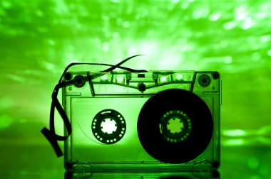 Cassette tape and multicolored lights clipart