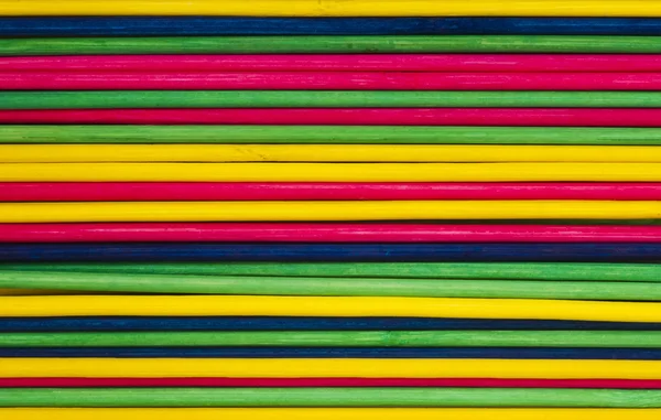 Fond coloré avec des bâtons — Photo